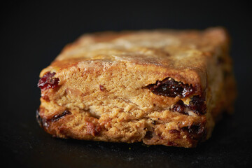 Raspberry scones on a black background