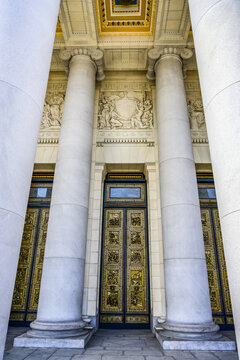 Ornate doorway, facade and columns on a building; Havana, Cuba