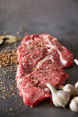 Raw meat with garlic and spices, seasoning