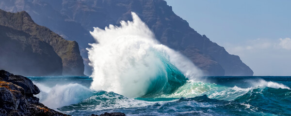Tropical ocean waves crashing and splashing, Na Pali Coast; Kauai, Hawaii, United States of America