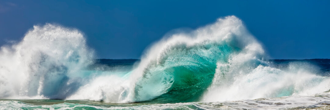 Tropical ocean wave crashing and splashing, Na Pali Coast; Kauai, Hawaii, United States of America