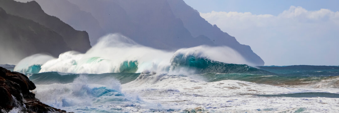 Tropical ocean waves crashing and splashing, Na Pali Coast; Kauai, Hawaii, United States of America