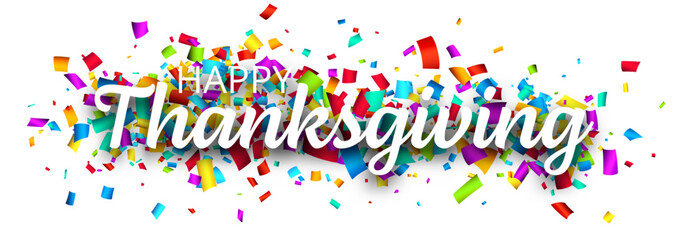 Happy thanksgiving sign over colorful confetti background.