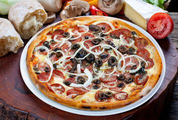Pizza with olives, pepperoni and onion