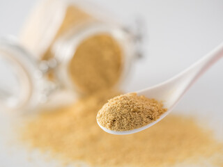 Nutritional inactive yeast in spoon