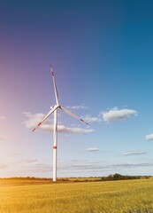 Windmill park with clouds and a blue sky. Nature view with wind turbine in Ukraine. Green energy and a sustainable future