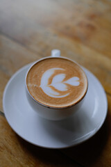 Beautiful close up shot of cappuccino coffee with Latte art.