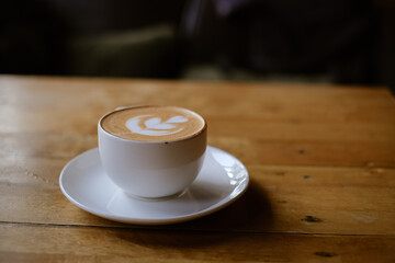 Beautiful close up shot of cappuccino coffee with Latte art.