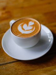 Beautiful close up shot of cappuccino coffee with Latte art.