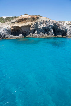 Turquoise ocean water along the coast of Galazia Nera Bay; Polyaigos Island, Cyclades, Greece