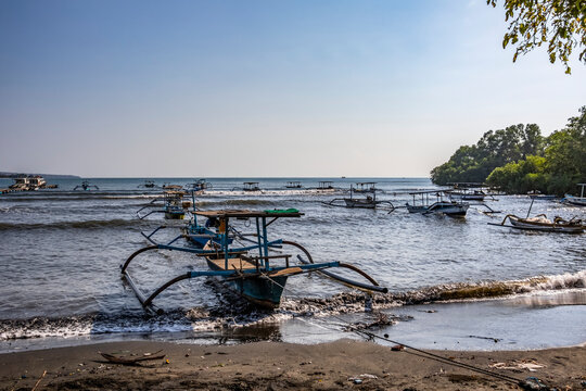Indonesian jukung, traditional wooden outrigger canoes; Lalang, Bali, Indonesia