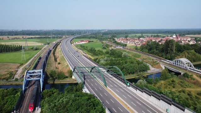 Aerial view of the highway and high speed rail, Bernate, near Milan, Italy