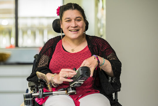 Maori woman with Cerebral Palsy in a wheelchair; Wellington, New Zealand