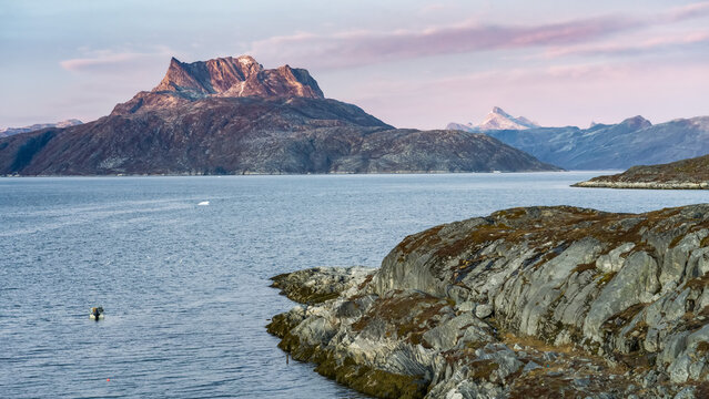 Rugged coastline along the Nuup Kangerlua fjord at Nuuk; Nuuk, Sermersooq, Greenland