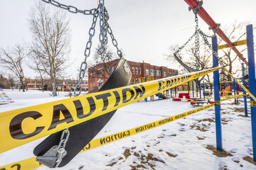 A playground cordoned off with caution tape during the COVID-19 World Pandemic; Edmonton, Alberta, Canada