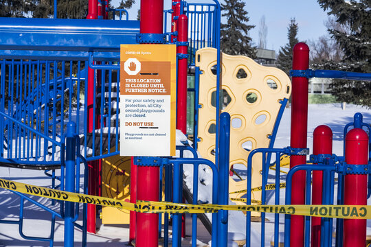 A playground cordoned off with caution tape during the COVID-19 World Pandemic; Edmonton, Alberta, Canada