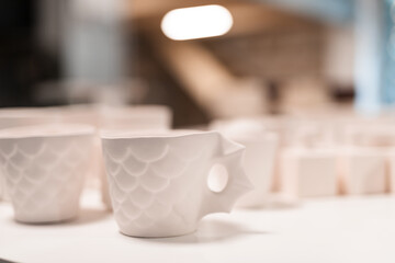 selective focus of ceramic mugs. art concept