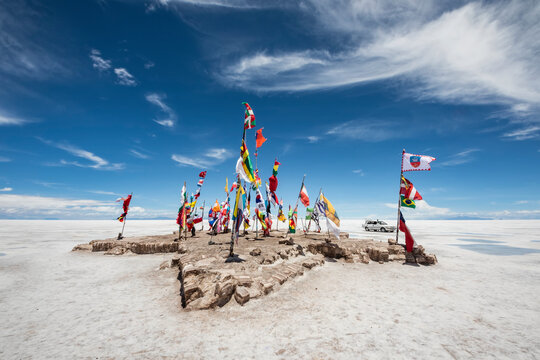 Flags of countries participating in the Bolivia Dakar Rally on Salar de Uyuni, the world's largest salt flat; Potosi Department, Bolivia