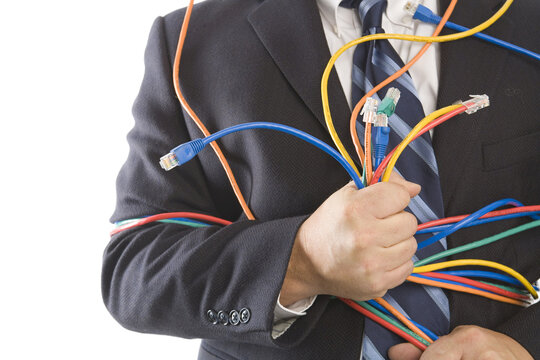 Close-up of Businessman Holding CAT5 Cables