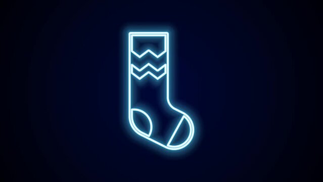 Glowing neon line Socks icon isolated on black background. 4K Video motion graphic animation