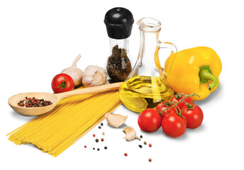 Spaghetti, vegetables and other ingredients on desk