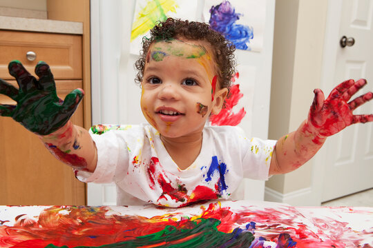 Little Boy Finger Painting