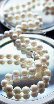 String of Pearls on Compact Mirror