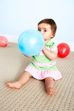 Baby Girl with Balloon