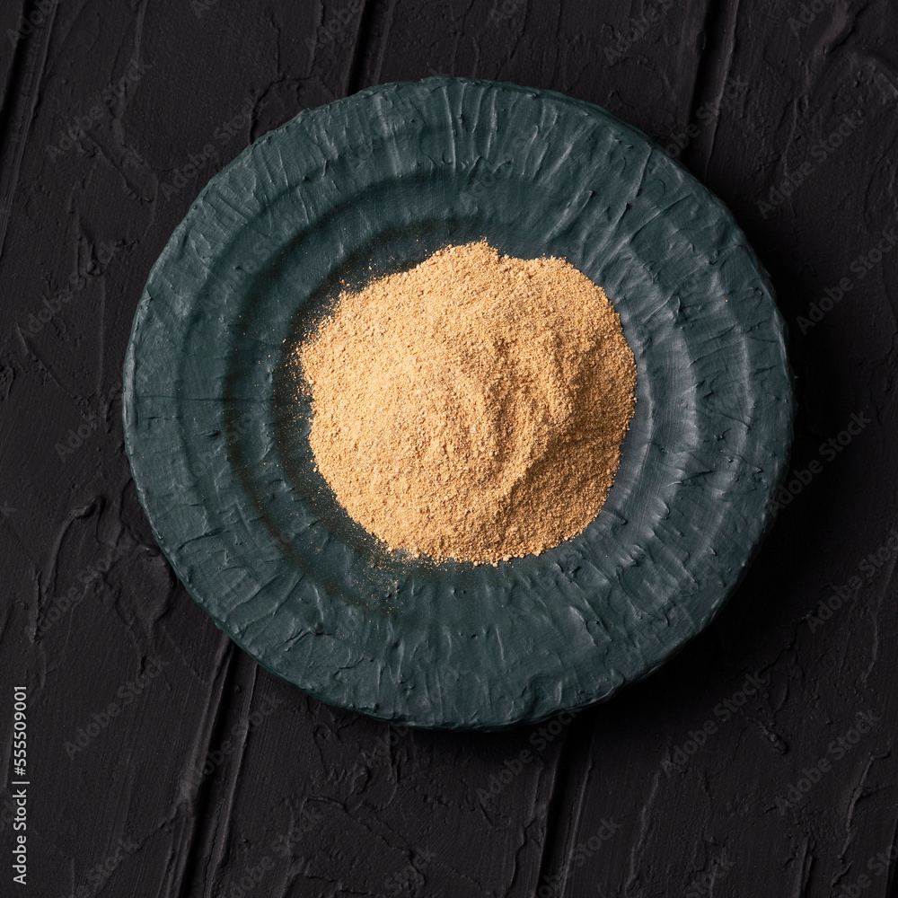 Poster organic lepidium meyenii powder in the bowl - maca andean ginseng