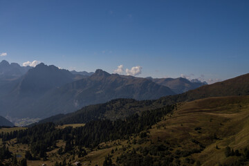 Sunny day on Rolle Pass in Dolomites