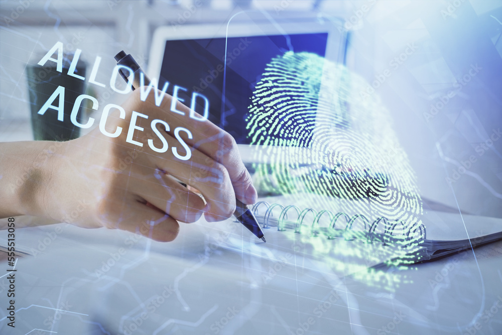 Poster blue fingerprint hologram over hands taking notes background. concept of security. double exposure
