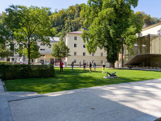 Green university courtyard in Salzburg.