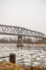 Brownville bridge over the massive and icy Missouri river during the winter