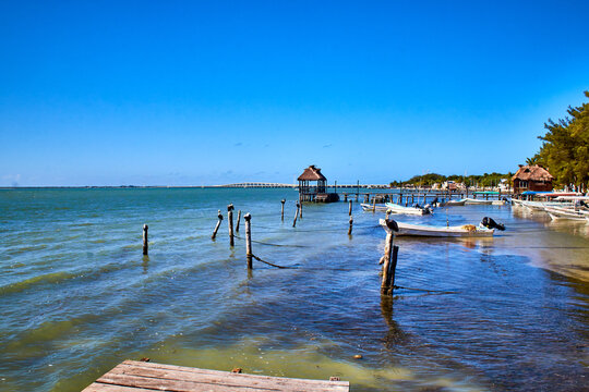 lagoon near to the sea, boats and pier in lagoon of terminos in isla aguada campeche 
