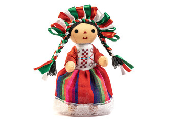 Colorful traditional Mexican rag handmade doll isolated in white.
Doll with long braids and ribbons using the colors of the Mexican flag.
