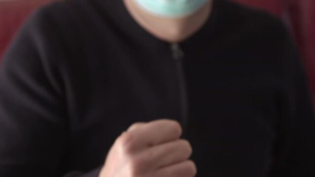 cash Sheqel Israel currency paper 200 shekel nominal banknotes. Closeup of israeli man in face mask