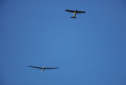 Glider Being Towed by Airplane