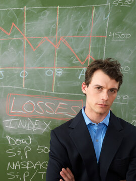 Businessman in Front of Blackboard