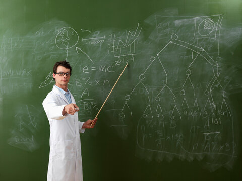Teacher at Blackboard