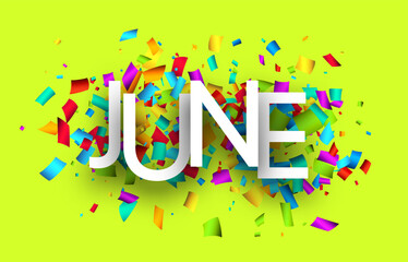 June word over colorful cut out ribbon confetti background.