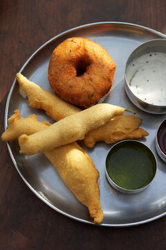 Medhu Vada, Chili Pakora, Coconut Chutney, and Mint Sauce