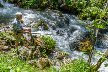 Fishing in the Grosswalsertal, Marultal, at Laguzbach, State of Vorarlberg, Austria