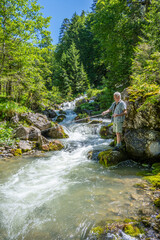 Fishing in the Grosswalsertal, Marultal, at Laguzbach, State of Vorarlberg, Austria
