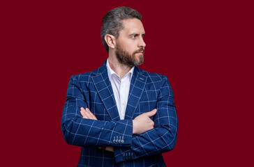 charismatic formal man wear menswear isolated on red background. man in formal menswear