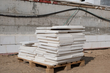 Pallet of wall tiles, uncompleted working, building material on construction site in Israel.