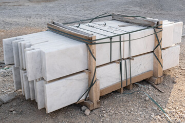 Pallet of marble, building material. Rock Blocks, Grey Shapes. New for use on construction site in Israel.