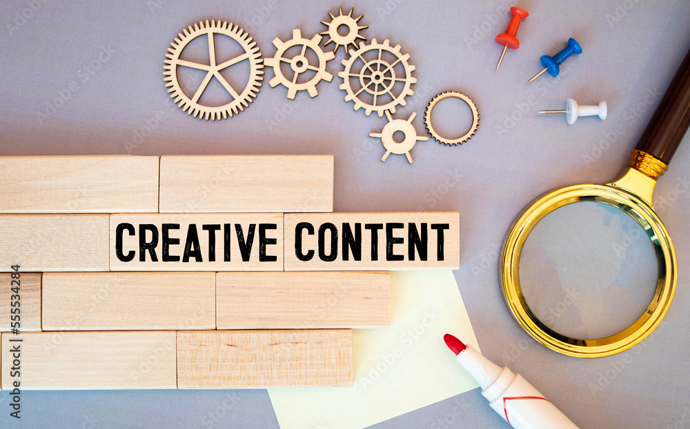 Poster on a white background - a bright red notebook on a spiral. text creative content.