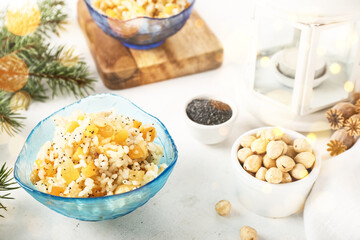 Bowl of Ukrainian rice Kutya dish on light table
