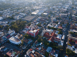 Beautiful aerial view of the City of San Salvador, capital of El Salvador - Its cathedrals and buildings - obrazy, fototapety, plakaty