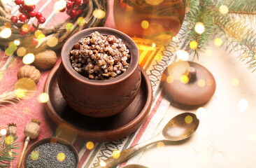 Fototapeta na wymiar Pot of Christmas Kutya dish on table